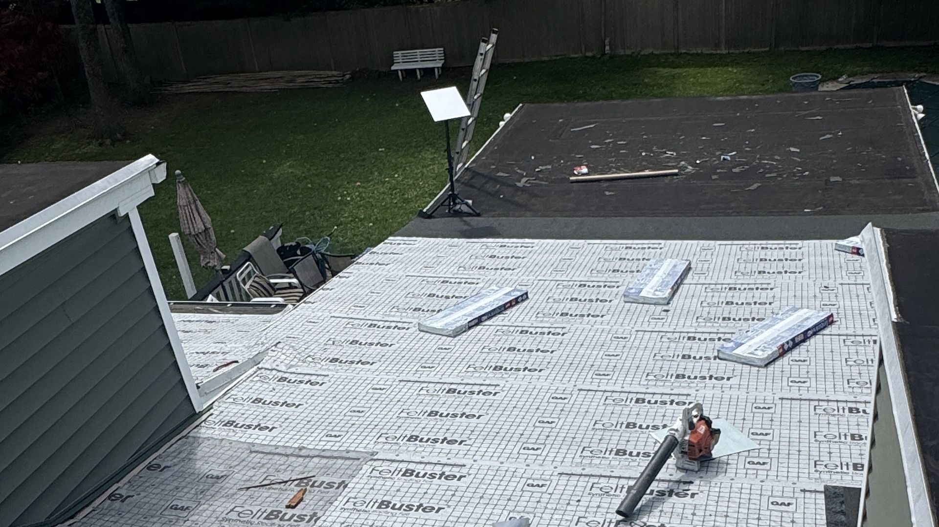 Emergency roof dry-in with GAF FeltBuster synthetic underlayment after storm damage on a North Jersey home