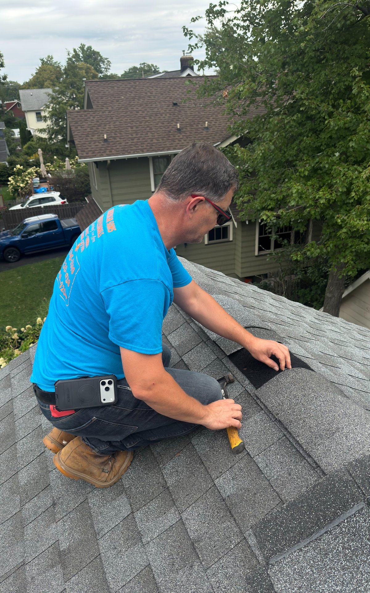 Sammy installing shingles on a roof repair in Flanders NJ